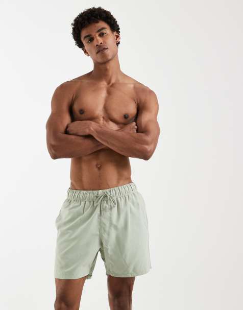 ASOS DESIGN – Mittellange Badeshorts in Salbeigrün - view 1