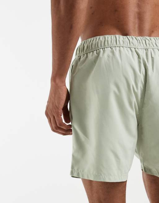 ASOS DESIGN – Mittellange Badeshorts in Salbeigrün, 3 von 5