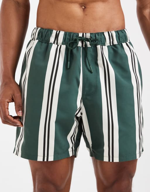 ASOS DESIGN – Mittellange Badeshorts mit grünem Streifen, 4 von 5
