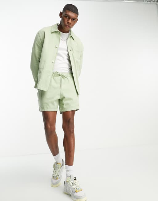 ASOS DESIGN Mittellange Cargo Shorts mit schmalem Schnitt in Grun Kombiteil ASOS