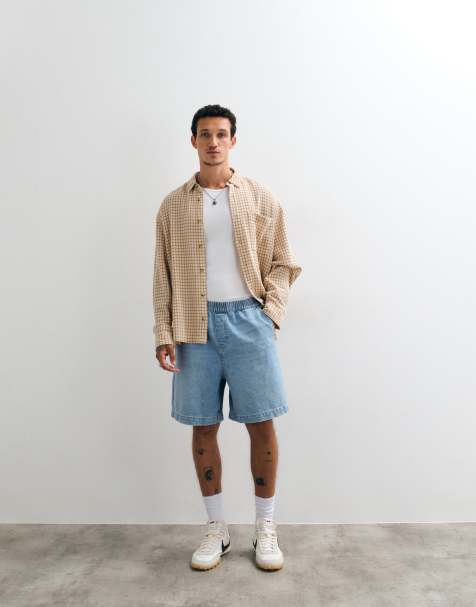 ASOS DESIGN – Mittellange Jorts in mittelblauer Waschung mit elastischem Bund - view 1
