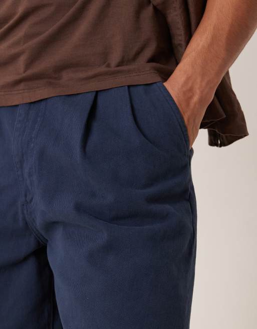 ASOS DESIGN – Mittellange Shorts in Marineblau mit doppelten Bundfalten, 5 von 5