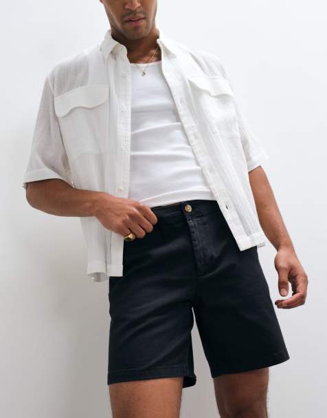 ASOS DESIGN – Mittellange Slim-Fit-Chinoshorts in Schwarz - view 1