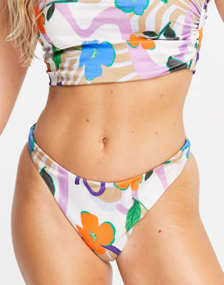 Slip bikini a vita bassa a V e sgambati con stampa a fiori misti Asos Donna Sport & Swimwear Costumi da bagno Bikini Bikini Sgambati Mix and Match 