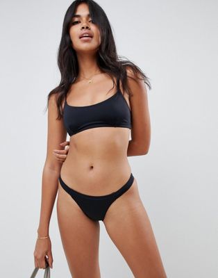 ASOS DESIGN – Mix-and-Match – Tanga-Bikinihose aus recyceltem Material mit seitlichem Riemendesign-Schwarz