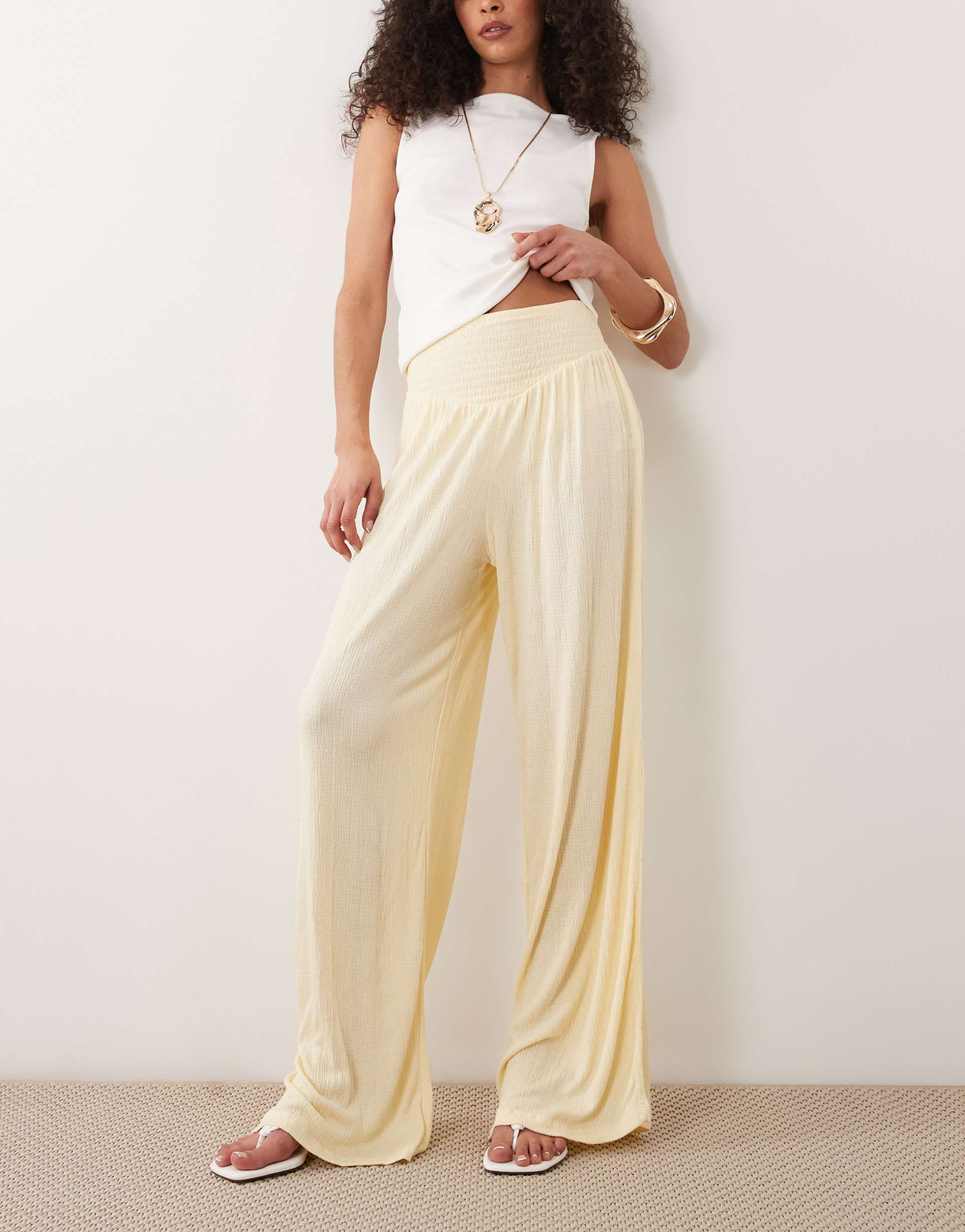 asos design mix & match crinkle shirred wide leg pants in butter yellow