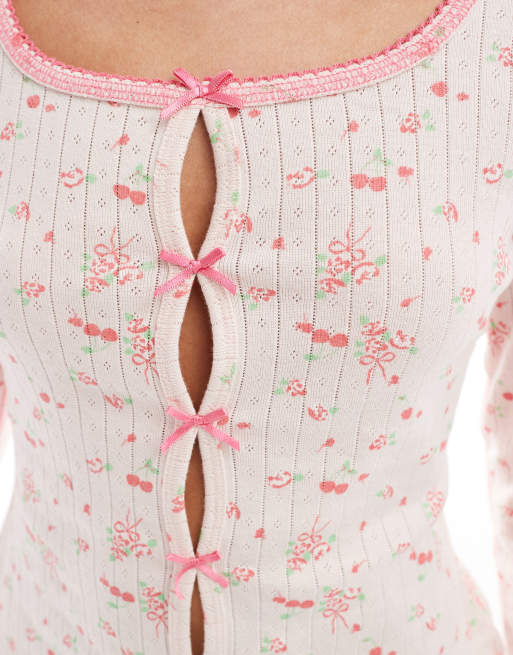 ASOS DESIGN mix & match ditsy bow print pointelle cardigan in pink