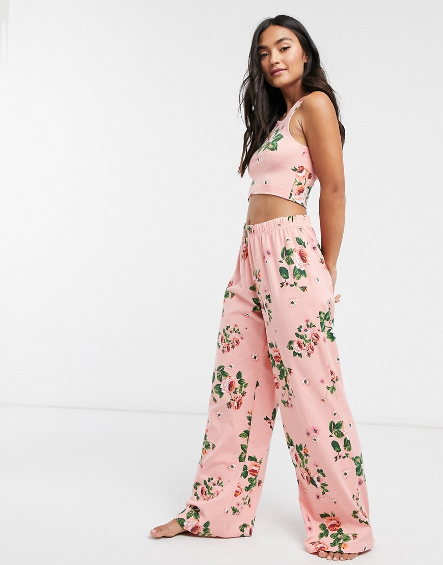 ASOS DESIGN - Mix & match - Jersey pyjamabroek met wijde pijpen en bloemenprint-Roze