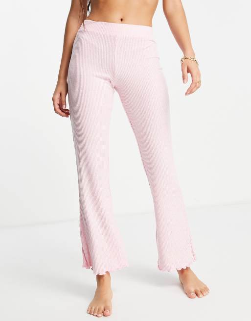 ASOS DESIGN mix & match lounge super-soft ribbed flare pants with lettuce  hem in pink