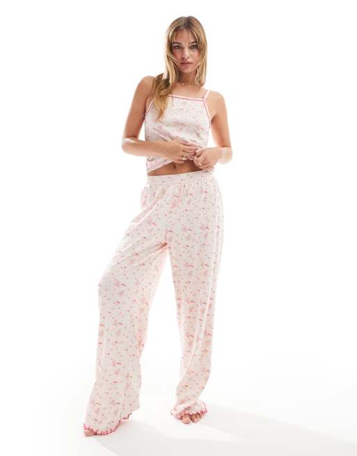 ASOS DESIGN – Mix & Match – Pointelle-Hose mit Blümchenmuster in Rosa mit Schleifenprint