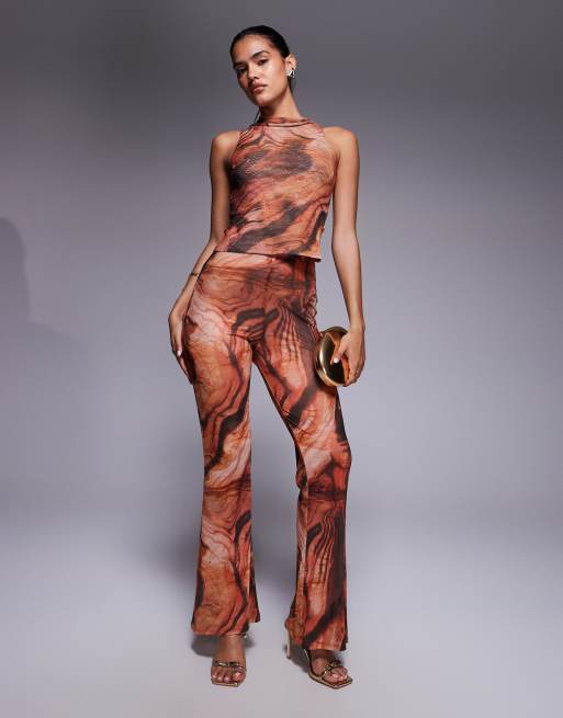 ASOS DESIGN – Mix & Match – Schlaghose aus transparentem Netzstoff in Orange mit abstraktem Muster