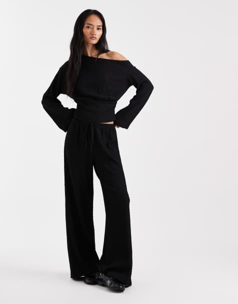 ASOS DESIGN – Mix & Match – Strukturiertes Set mit langärmligem Oberteil und Hose mit weitem Bein in Schwarz - view 1