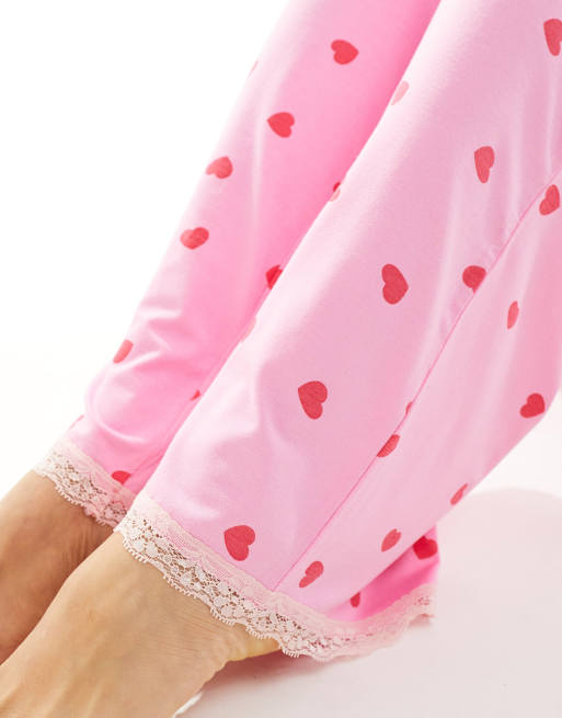 ASOS DESIGN mix match viscose heart print pajama pants in pink