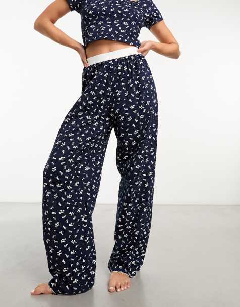ASOS DESIGN – Mixa & matcha – Marinblå, småblommiga pyjamasbyxor med synligt midjeband och picotkant - view 1