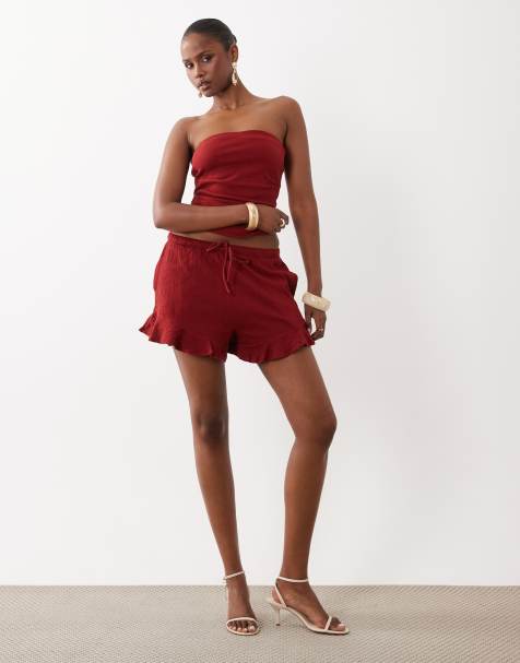 ASOS DESIGN – Mixa och matcha – Röda, krinklade shorts i bomull med volangfåll - view 1