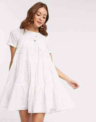 asos design petite tiered trapeze mini dress in broderie