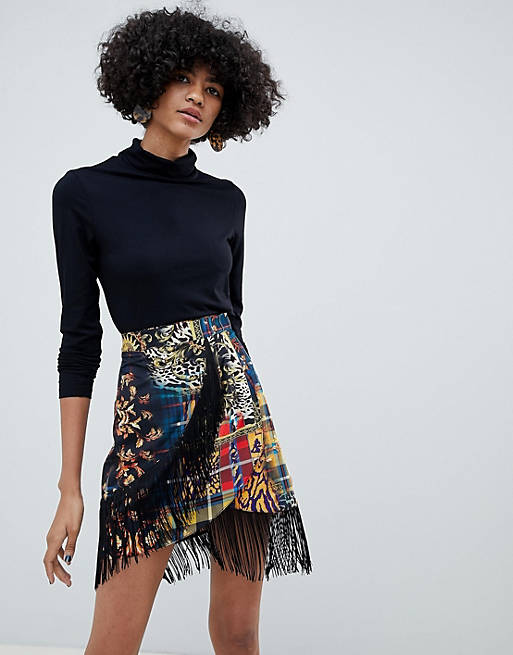 ASOS DESIGN mixed check print wrap mini skirt with fringing