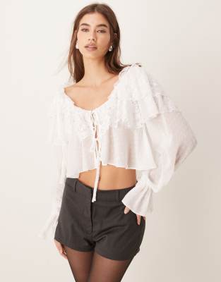 mixed lace & textured tie front ruffle blouse in ivory-White