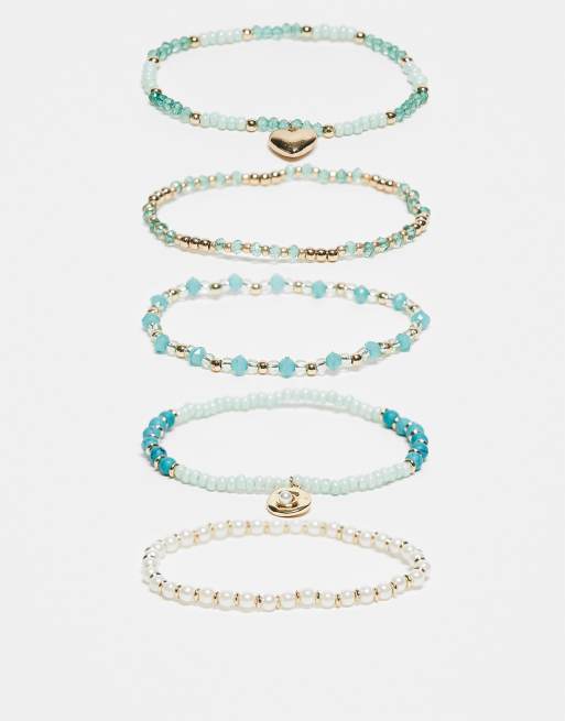 ASOS DESIGN mixed multipack of necklaces with blue beads and faux pearls in gold tone