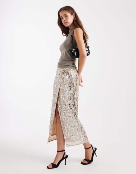 ASOS DESIGN mixed sequin wrap midi skirt in champagne - view 1