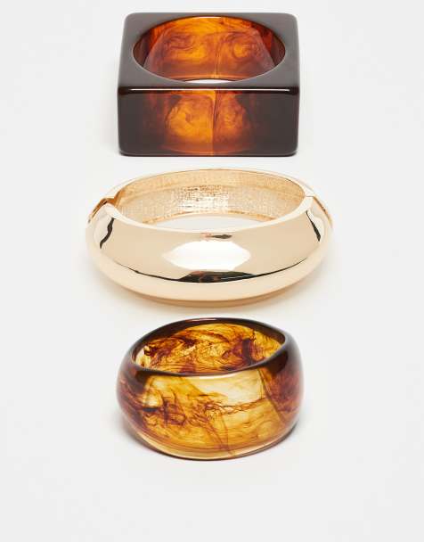 ASOS DESIGN mixed shaped-bangles with amber resins and gold tone - view 1