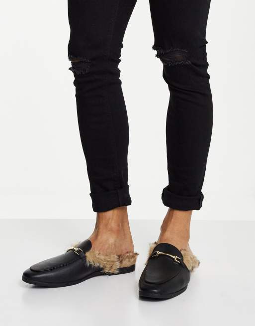 ASOS DESIGN Mocassins style mules ouverts sur l arri re en imitation cuir avec fausse fourrure Noir