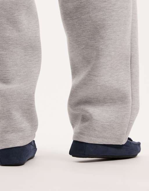 ASOS DESIGN moccasin slippers in navy with faux fur lining with tassel, 2 of 4
