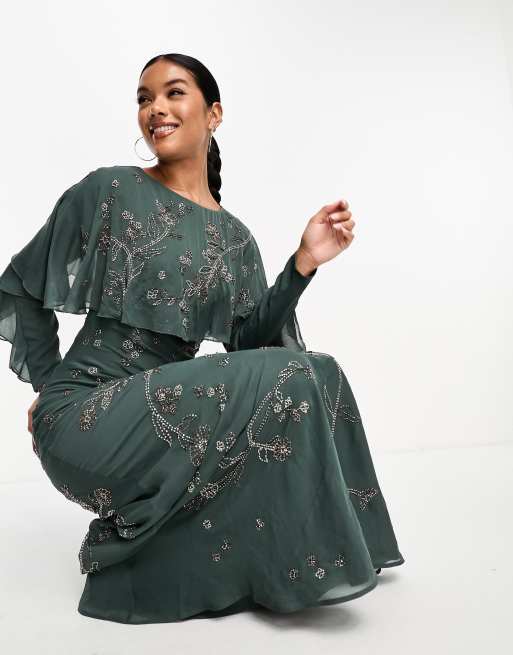 ASOS DESIGN Modesty embellished long sleeve ruffle bias maxi dress with  cape detail in dark green