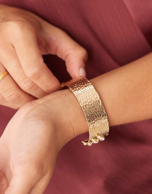 ASOS DESIGN molten cuff bracelet with diamante details in textured gold tone