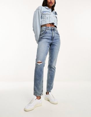 ASOS DESIGN slim mom jeans in mid blue with rip - ASOS Price Checker