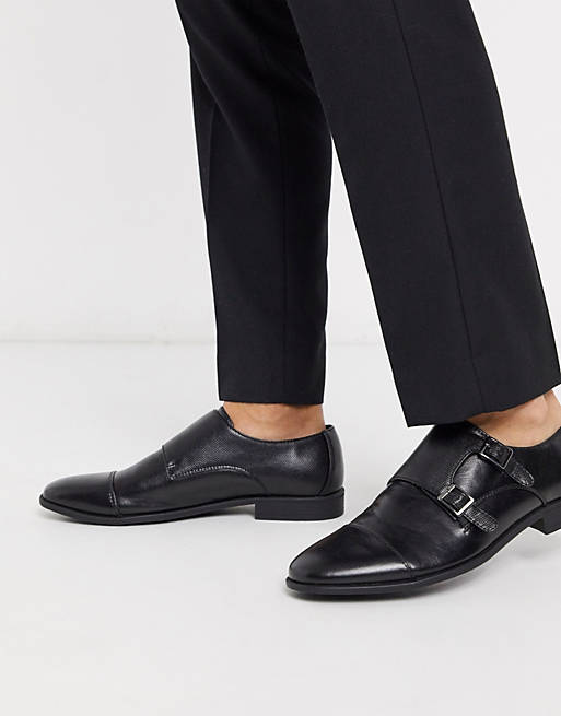ASOS DESIGN monk shoes in black faux leather with emboss panel | ASOS