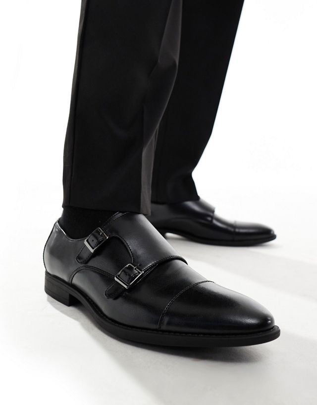 ASOS DESIGN monk shoes in black faux leather with emboss panel