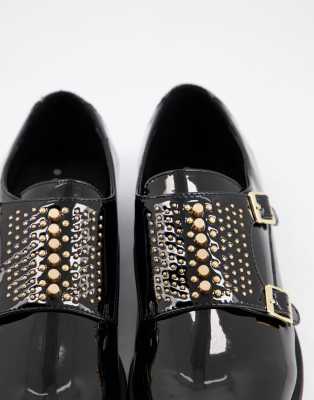 black shoes with gold studs
