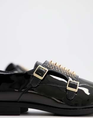 black shoes with gold studs