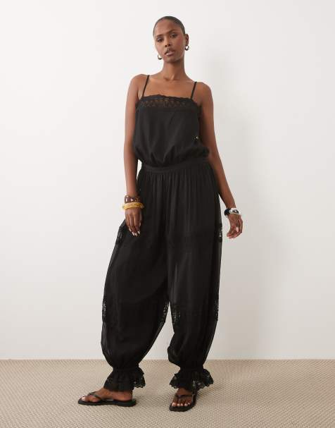 ASOS DESIGN - mono de encaje transparente con bajo abullonado en negro - view 1