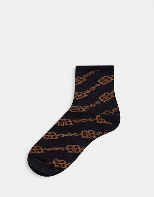 ASOS DESIGN monogram ankle socks in black