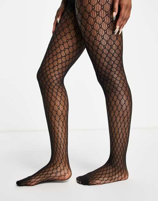 ASOS DESIGN lace tights with side cut out detail in black