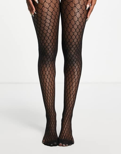 ASOS DESIGN monogram fishnet tights in black