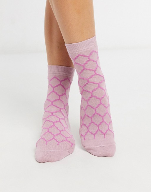 ASOS DESIGN monogram printed ankle sock in pink