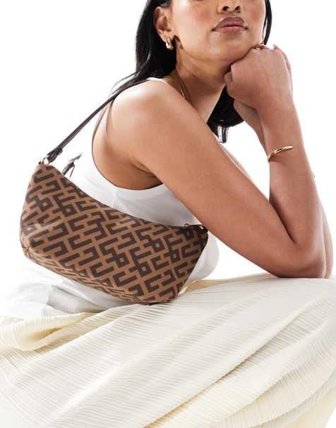 ASOS DESIGN monogram slouch shoulder bag in brown - view 1