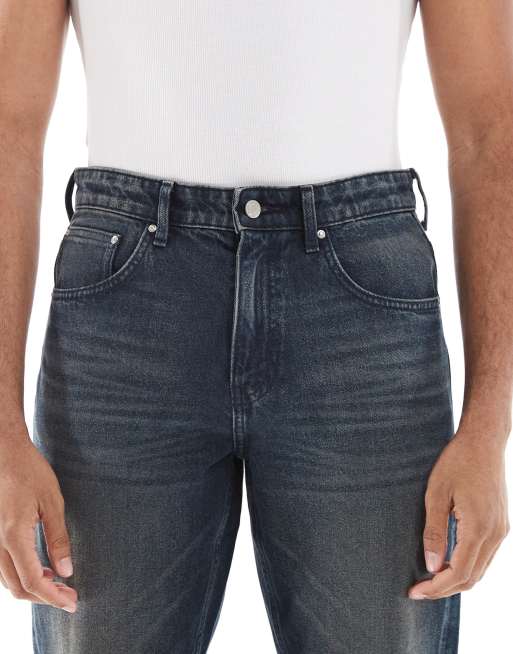 ASOS DESIGN – Mörkblå, avsmalnande jeans, 4 av 5