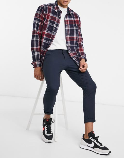 ASOS DESIGN – Mörkblå, beskurna chinos i vår smalaste passform