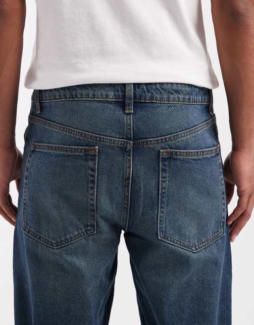 ASOS DESIGN – Mörkblå, smala jeans med blekning, 4 av 5