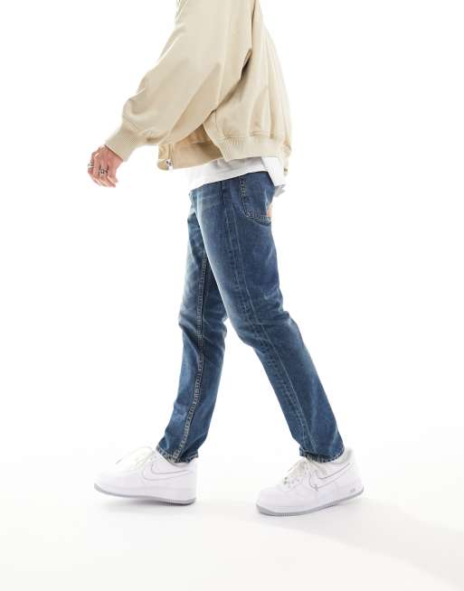 ASOS DESIGN – Mörkblå smala jeans med tvättad finish, 2 av 5