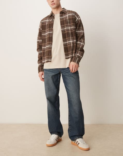 ASOS DESIGN – Mörkblå, tvättade jeans med baggy passform - view 1