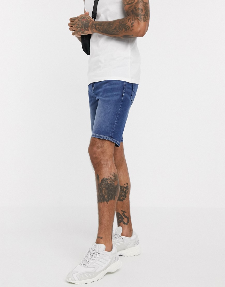 ASOS DESIGN – Mörkblå, tvättade jeansshorts med extra smal passform