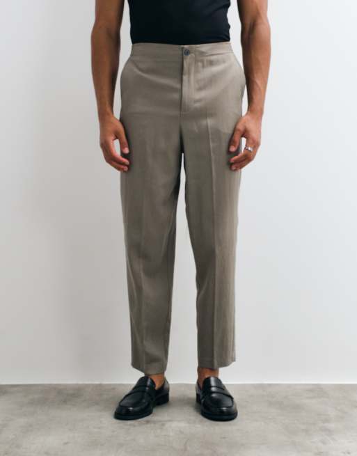 ASOS DESIGN – Mörkgröna, avsmalnande kostymbyxor med avslappnad passform, 3 av 5