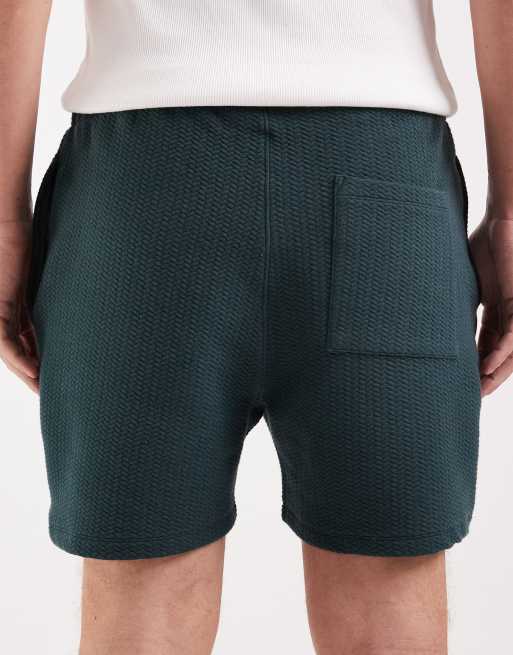 ASOS DESIGN – Mörkgröna, fiskbensmönstrade jersey-shorts i oversize med bubblig design, 4 av 5
