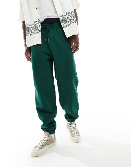 ASOS DESIGN – Mörkgröna, grova mjukisbyxor i oversize