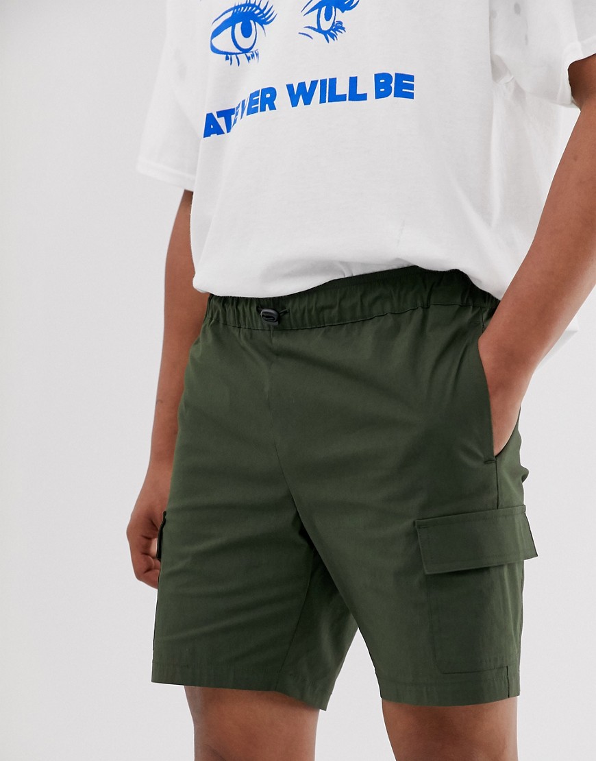 ASOS DESIGN – Mörkgröna shorts med smal passform i nylon